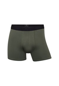 Olivengrønne boxershorts lavet af glat stof. Har et sort elastikliv med mærket "DOVRE" præsenteret på det.