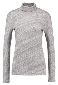Helles graues Langarm-Turtleneck-Oberteil für Frauen mit weicher, melierter Textur und taillierter Silhouette.