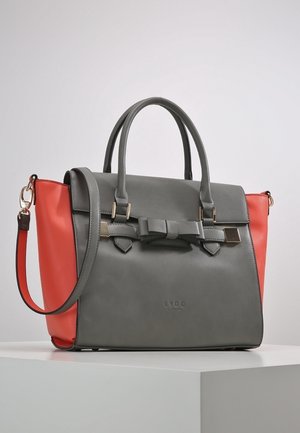Gray and red handbag with a bow detail and gold hardware. Smooth leather with structured shape; dual handles and detachable shoulder strap.