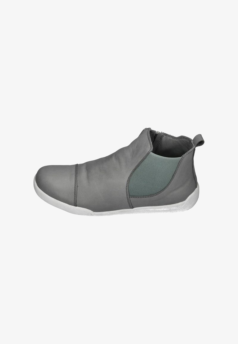 Grey slip-on shoe featuring a smooth material, elastic side panel, rounded toe, and white rubber sole. Minimalist design with no visible fasteners.