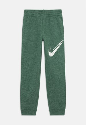 Zöld sportos jogging nadrág texturált anyagból, elasztikus derékpánttal és fehér Nike logóval a bal combon.