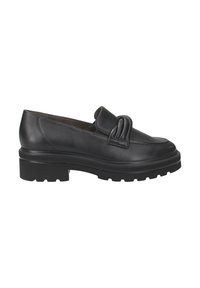 Mocasines de cuero negro con detalle de nudo en la parte superior, que presentan una suela de goma negra gruesa y texturizada, y un diseño de punta redondeada suave.