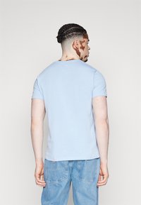Alpha Industries PP T - Potiskana majica - light blue