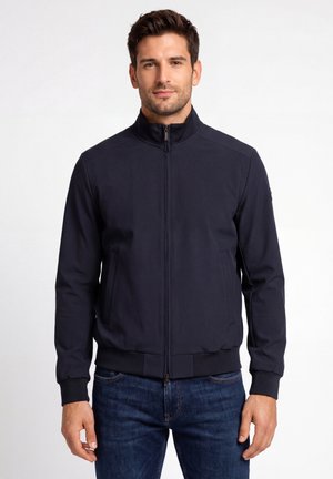 - Kurtka przejściowa