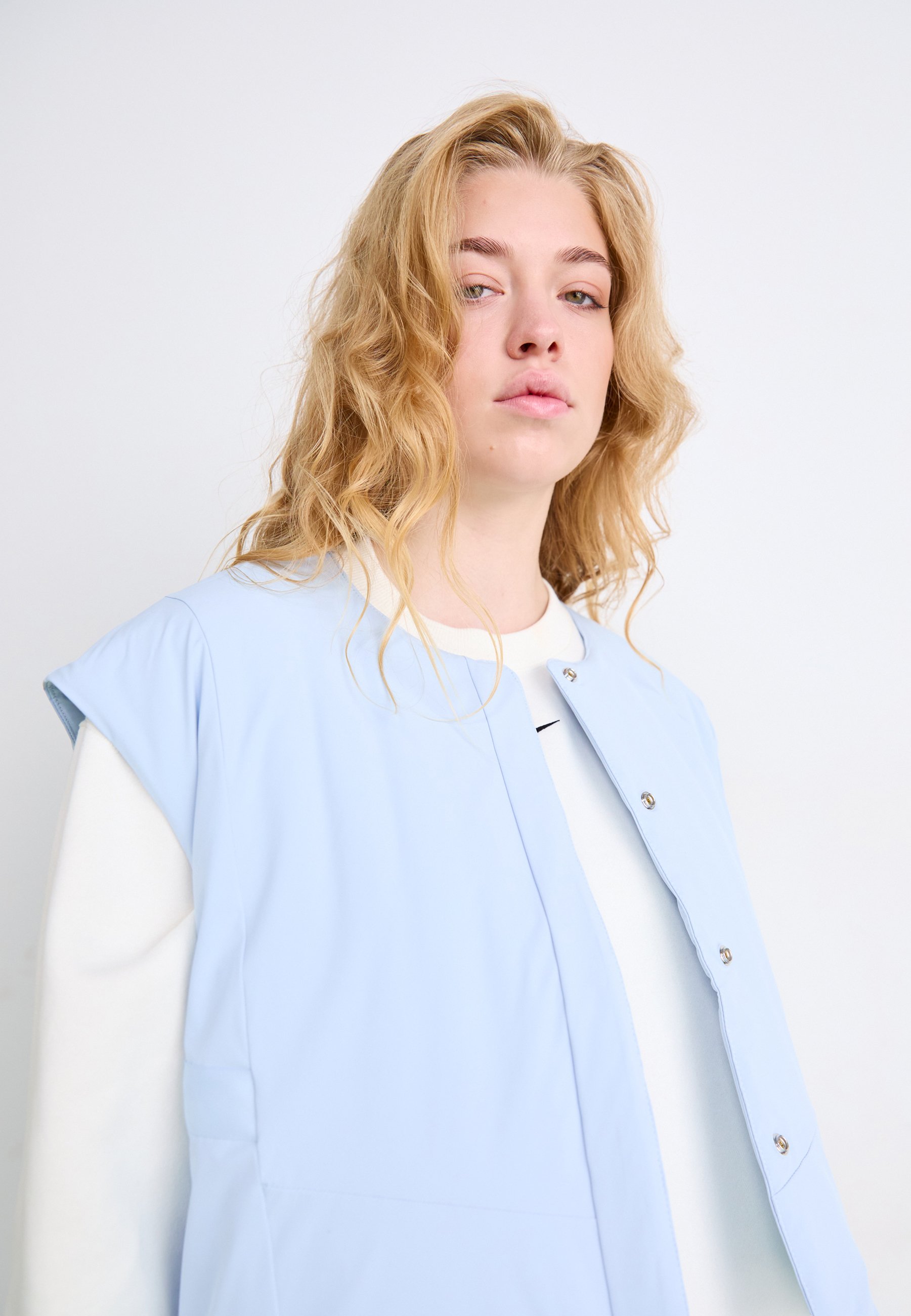 blue nike body warmer