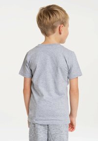 Gray cotton t-shirt with a crew neckline and short sleeves, featuring a smooth texture. Back view shows a simple design without embellishments.