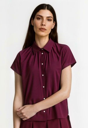 Užsagstoma palaidinė - ruby glow