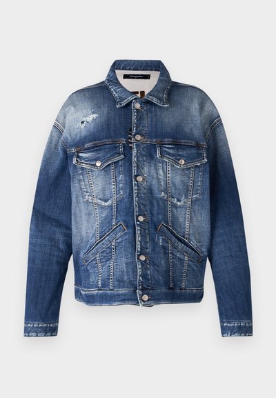 Denim jacket in varying shades of blue, with a distressed finish, two chest pockets, side pockets, visible stitching, and metal buttons.