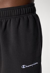 Champion ICONS CUFF PANTS - Jogginghose - black