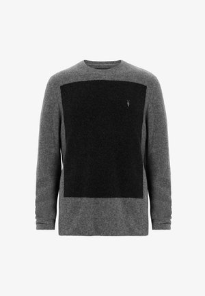 Grijze pullover trui met een zwart gestructureerd rechthoekig paneel aan de voorkant. Voorzien van een ronde halslijn en lange mouwen.