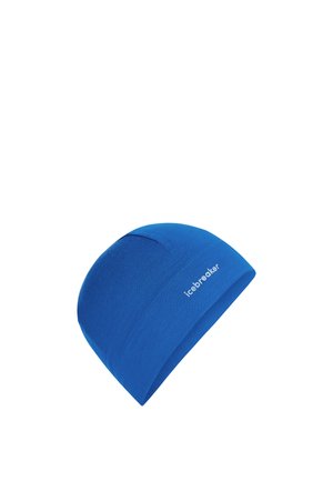 Blue close-fitting knit beanie with "icebreaker" logo on the side, designed for warmth and outdoor use.