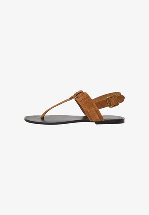 Brown suede sandal with a thong design, adjustable buckle strap, black sole, and decorative studs along the edge. Flat profile.