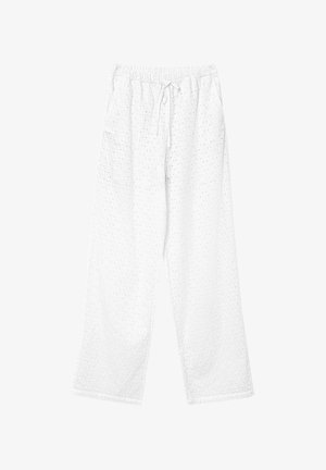Pantaloni bianchi in cotone con vestibilità ampia, dotati di dettagli in occhio di pernice, vita elasticizzata e chiusura con laccetto. Design a gamba dritta.