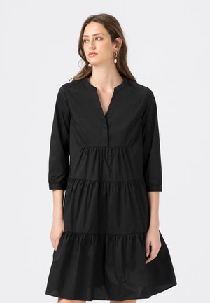 HÄNGERCHEN AUS MIT STUFENVOLANTS - Shirt dress - schwarz