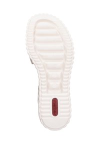 Semelle de chaussure en caoutchouc blanc avec des nervures texturées, un logo rouge près du talon et un bord légèrement surélevé tout au long du périmètre.
