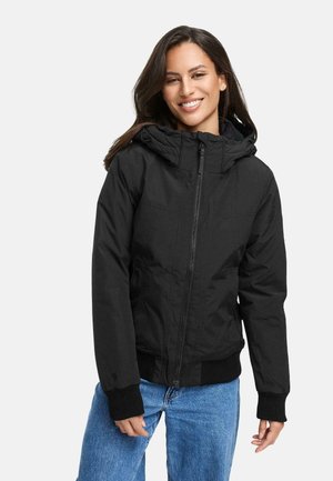 Black hooded jacket with a zip front, ribbed cuffs, and two front pockets. Made from durable material, featuring a smooth texture.