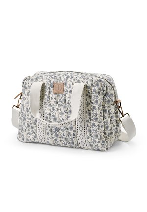 Pudebroderet stofhåndtaske med blåt blomsterprint, brede hvide håndtag med sort diamantsyning og aftagelig skulderrem med guldfarvet hardware.