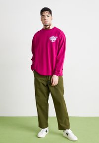 Manastash FLEX CLIMBER WIDE LEG - Pantalon classique - oliv