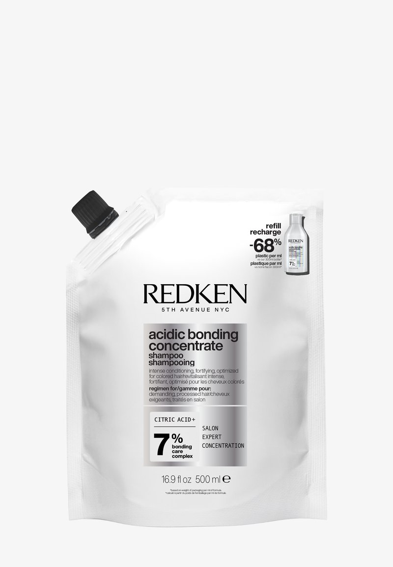 Recharge de shampooing Redken Acidic Bonding Concentrate avec bouchon noir, 500 ml, contenant 7% de complexe de soin des liaisons et informations sur la réduction de l’utilisation du plastique.