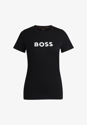 Black t-shirt made of cotton with short sleeves, featuring "BOSS" printed in bold white letters across the chest, round neckline.