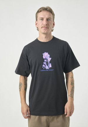 Black cotton t-shirt featuring a pink and blue graphic design with text, short sleeves, and a relaxed fit.