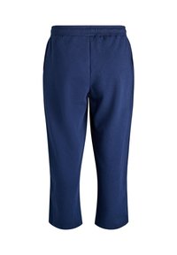 Navy blue lyhyet collegehousut, valmistettu pehmeästä kankaasta, jossa on joustava vyötärö ja sivutaskut. Minimalistinen muotoilu ilman näkyviä kuvioita.
