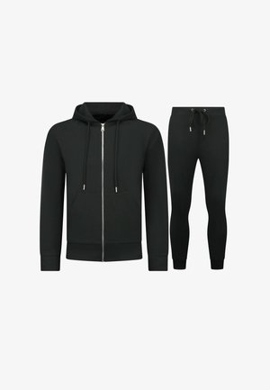 Zwarte hoodie met rits en voorzakken en bijpassende zwarte joggingbroek met aantrekkoord in de taille en geribde enkels.