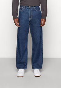 Dr.Denim OMAR - Calças de ganga de corte relaxado - pebble dark retro