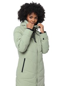 Padded long coat in light green with a high collar, zip front, two side pockets, and adjustable drawstring. Textured, quilted design.