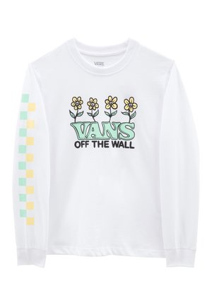 Hvid langærmet T-shirt med blomstergrafik, der har gule blomster og grønne stængler. Venstre ærme har et flerfarvet ternet design.