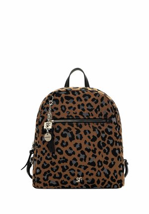 Leopard print backpack with a zipper, black accents, and a charm. Made from fabric with a textured surface, featuring a round shape.