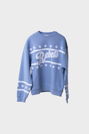 Light blue sweatshirt with "Rebels" text and white stars across chest and sleeves, displayed against a plain background.