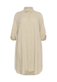 Beige blousejurk met kraag, opgerolde mouwen en een losse pasvorm, gemaakt van lichte stof voor comfort.
