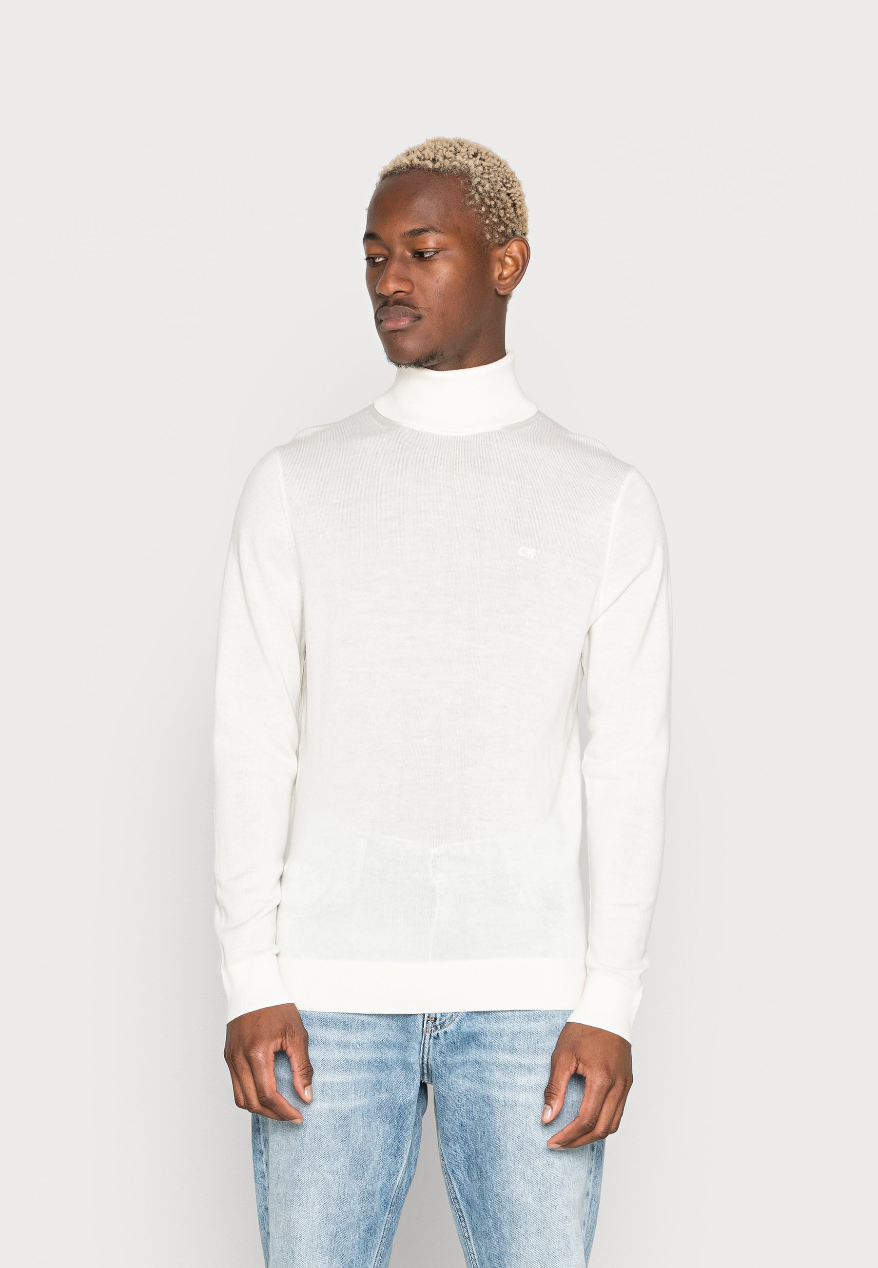 white jumper turtle neck