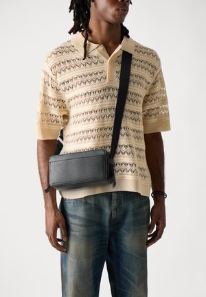 REMYY UNISEX - Sac bandoulière - black