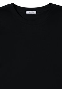 Schwarzes T-Shirt mit kurzen Ärmeln aus glattem Stoff und Rundhalsausschnitt. Verfügt über ein Etikett mit der Aufschrift "CECI" am inneren Kragen.