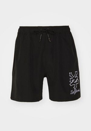 Shorts de bain noirs en tissu lisse, dotés d'une taille élastique avec cordon de serrage et d'un logo Zoo York brodé en blanc sur l'ourlet.