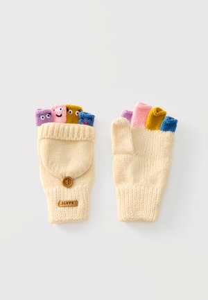 Moufles convertibles en maille crème avec des bouts de doigts colorés, chacune arborant de petits visages souriants, posées à plat sur un fond blanc.