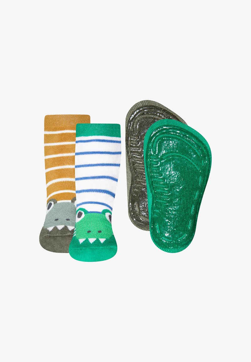 Zestaw skarpetek dziecięcych z dwoma wzorami: jeden z pomarańczowymi paskami i motywem dinozaura, a drugi w zielono-niebieskie paski z wizerunkiem krokodyla.