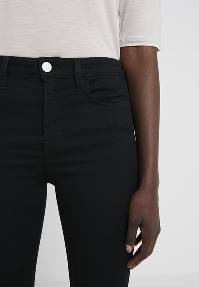 Filippa K LOLA SUPER STRETCH - Calças de ganga de corte skinny - black