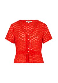 Blouse en dentelle rouge à manches courtes, décolleté en V, fermeture à boutons et détail à nouer à la taille. Les bords festonnés rehaussent le design.