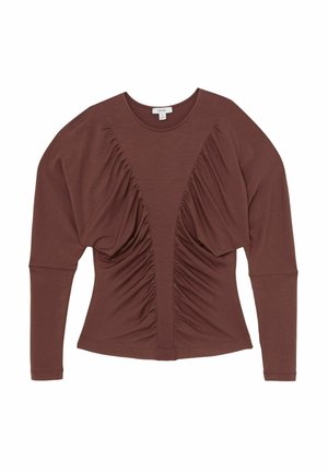 Dlhý rukáv topu v bohatom hnedom odtieni s nariasenými detailmi vpredu, okrúhlym výstrihom a priliehavým strihom. Vyrobený z mäkkej látky.