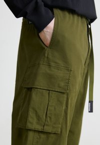 Manastash FLEX CLIMBER - Kargopüksid - oliv