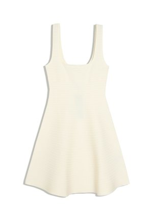 Robe sans manches de couleur crème avec un corsage ajusté et une jupe évasée, présentant un décolleté carré et de larges bretelles.