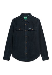 Granatowa koszula z kordurowego materiału, z długimi rękawami, z guzikami z przodu, dwoma kieszeniami na piersi, brązowymi guzikami oraz tkanym metkiem na lewej kieszeni.