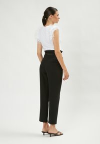 INFLUENCER CARROT  - Broek - black