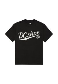 Černé tričko z bavlny s velkým bílým potiskem loga "DCshoe Co." na přední straně. Klasický střih s krátkými rukávy.