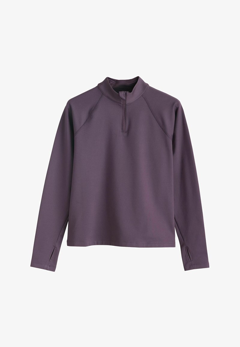 Pull-over violet en matière douce, avec col cheminée et fermeture à demi-zip. Manches longues avec ouverture pour le pouce pour plus de confort.