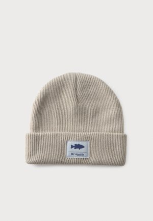 Light gray ribbed knit beanie with folded brim and a patch featuring a dark fish silhouette and Columbia brand logo.
