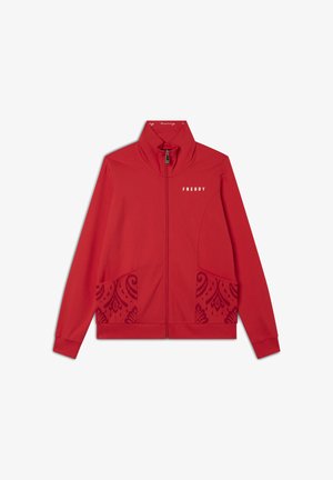 Giacca zip-up rossa con colletto alto, caratterizzata da un motivo paesley testurizzato sulle tasche e un logo bianco sul petto. Tessuto liscio, design aderente.